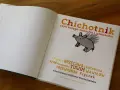 Otwarta książka "Chichotnik" z ilustracją latającej świnki, pełna autorów znanych z książek z dużą dawką humoru.